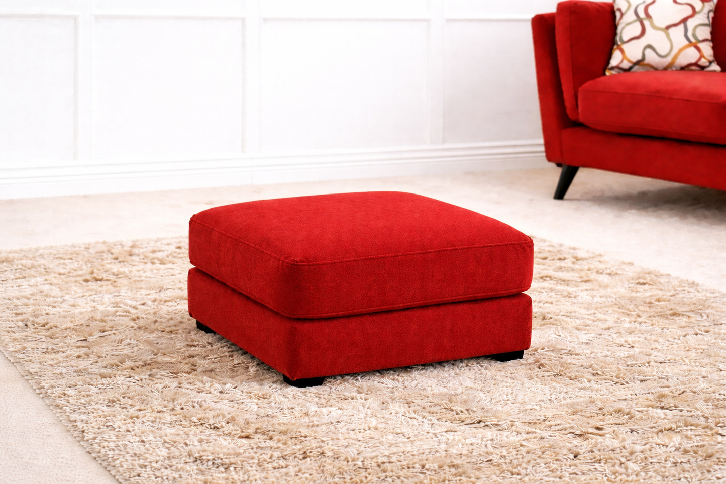 Blake Footstool In Oxblood Red available at Sofa Emporium Retford