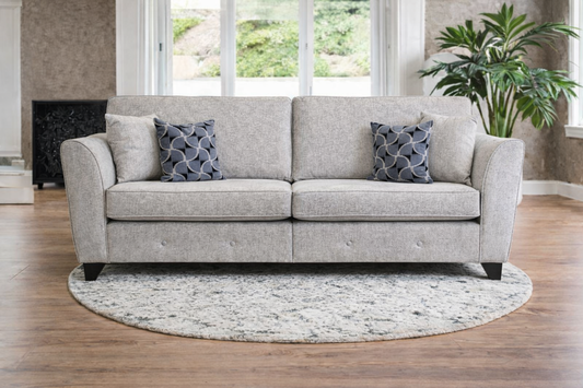 Cosmos 4 Seater Formal Back Sofa In Grey available at Sofa Emporium Retford